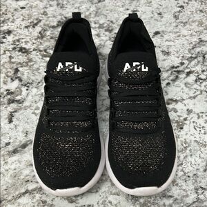 APL Black Techloom Breeze Sneakers with Gold Accents - size 8.5